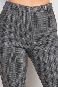 Pantalones pitillo a cuadros con lengüeta de botones