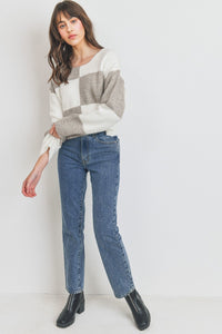 Suéter de manga larga con cuello redondo y bloque de color